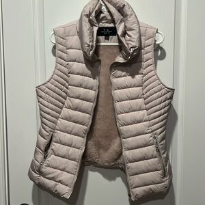 LA Coalition Faux fur lined puffer vest. Cozy and stylish